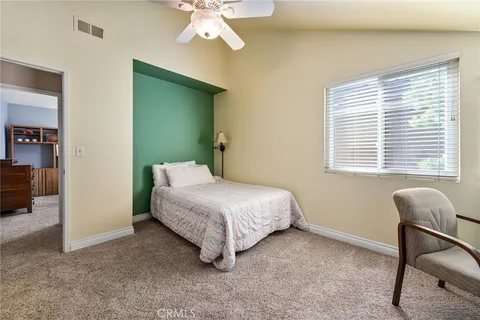 an aerial view of residential building with parking space