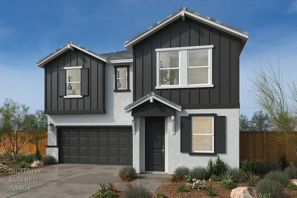 a front view of a house with a garage