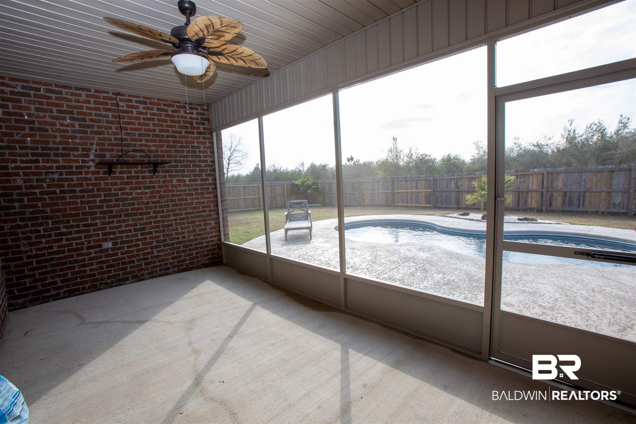 7029 Rocky Rd Loop Gulf Shores, AL 36542 - Photo 41 of 43 screened porch