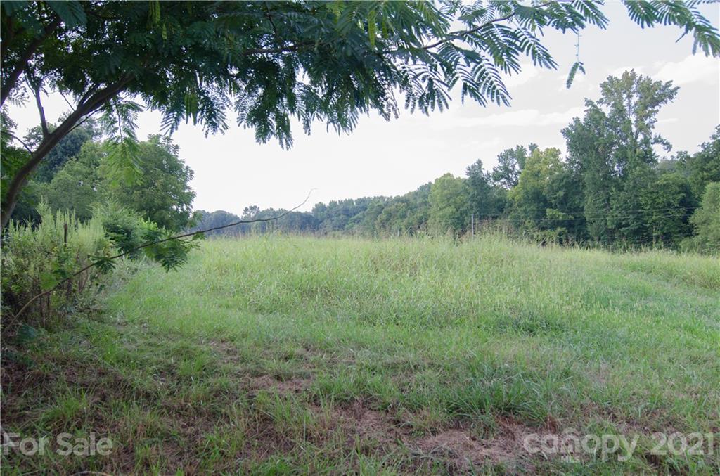 0 Edwards Road Wingate, NC 28174 - Photo 5 of 5 a view of a lake with a yard
