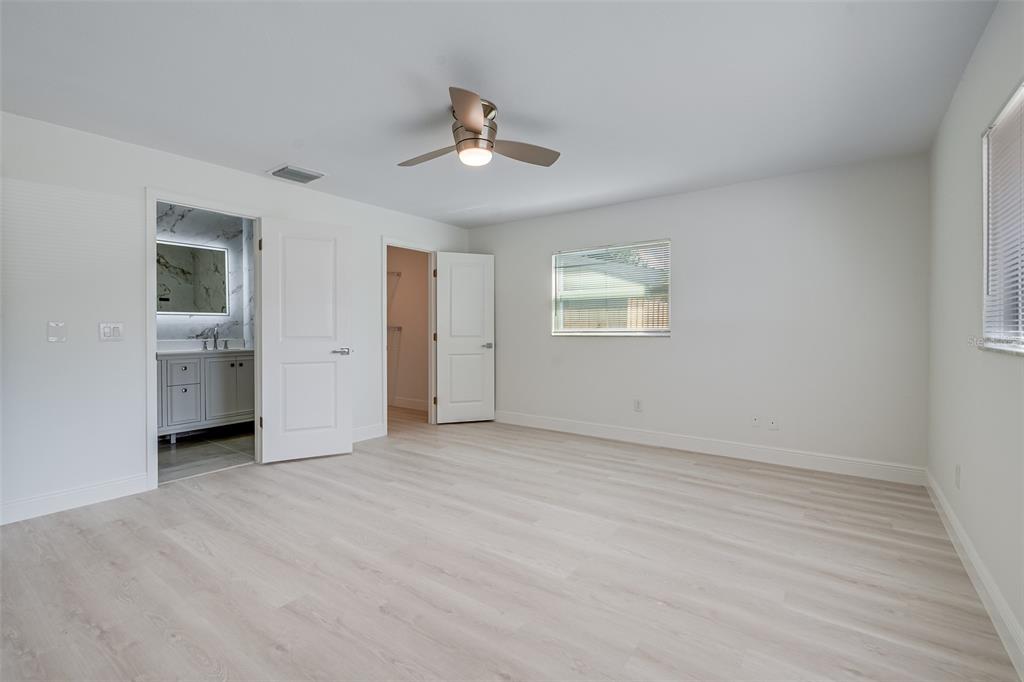 1806 Forest Drive Oldsmar, FL 34677 - Photo 16 of 23 a view of an empty room with a window