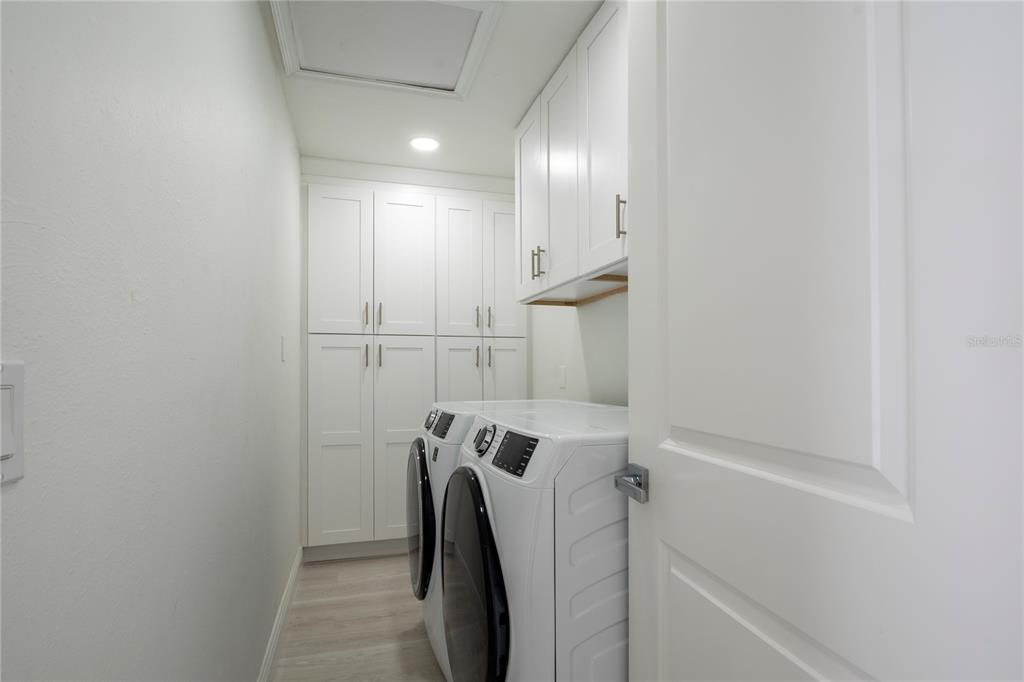 1806 Forest Drive Oldsmar, FL 34677 - Photo 9 of 23 a view of a storage and utility room with utility room