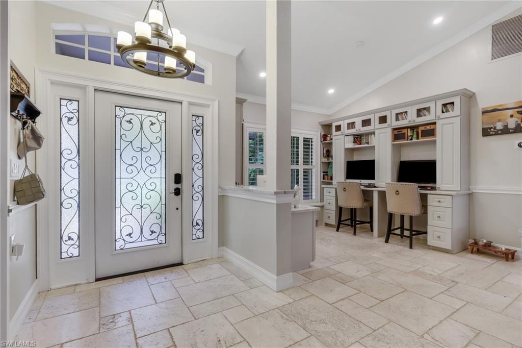 431 Ibis Way Naples, FL 34110 - Photo 6 of 37 a view of a livingroom with furniture and window