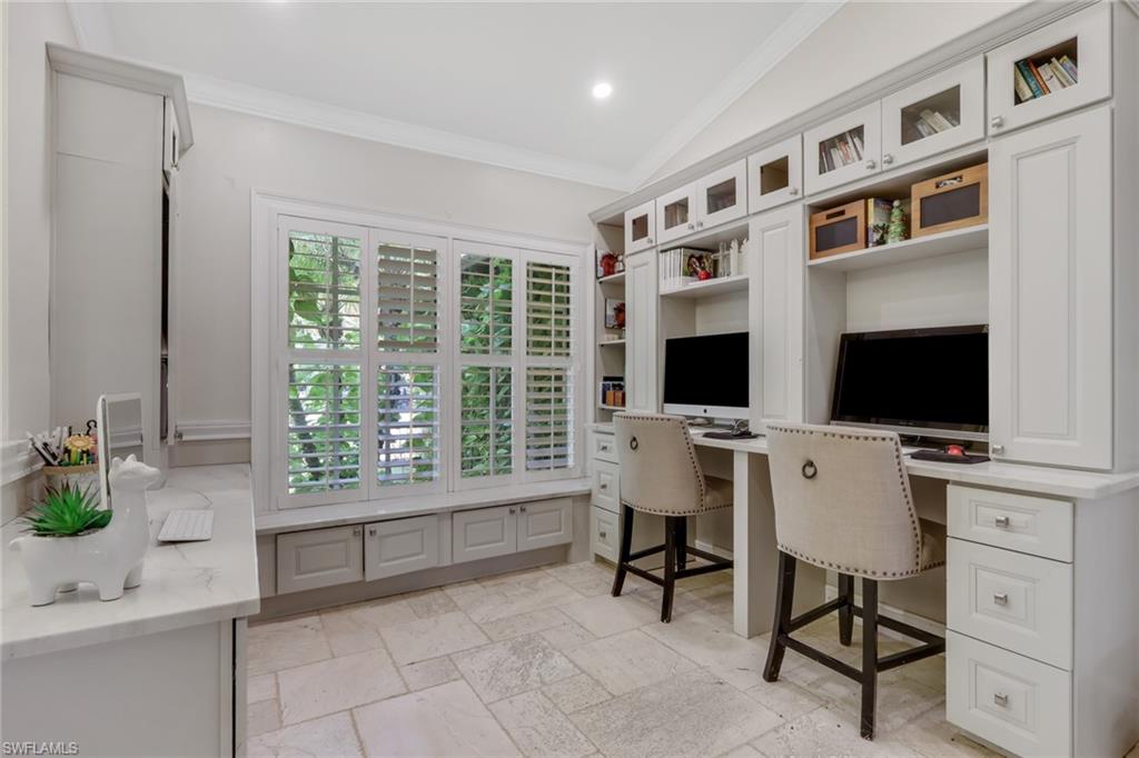 431 Ibis Way Naples, FL 34110 - Photo 7 of 37 a living room with furniture and a flat screen tv