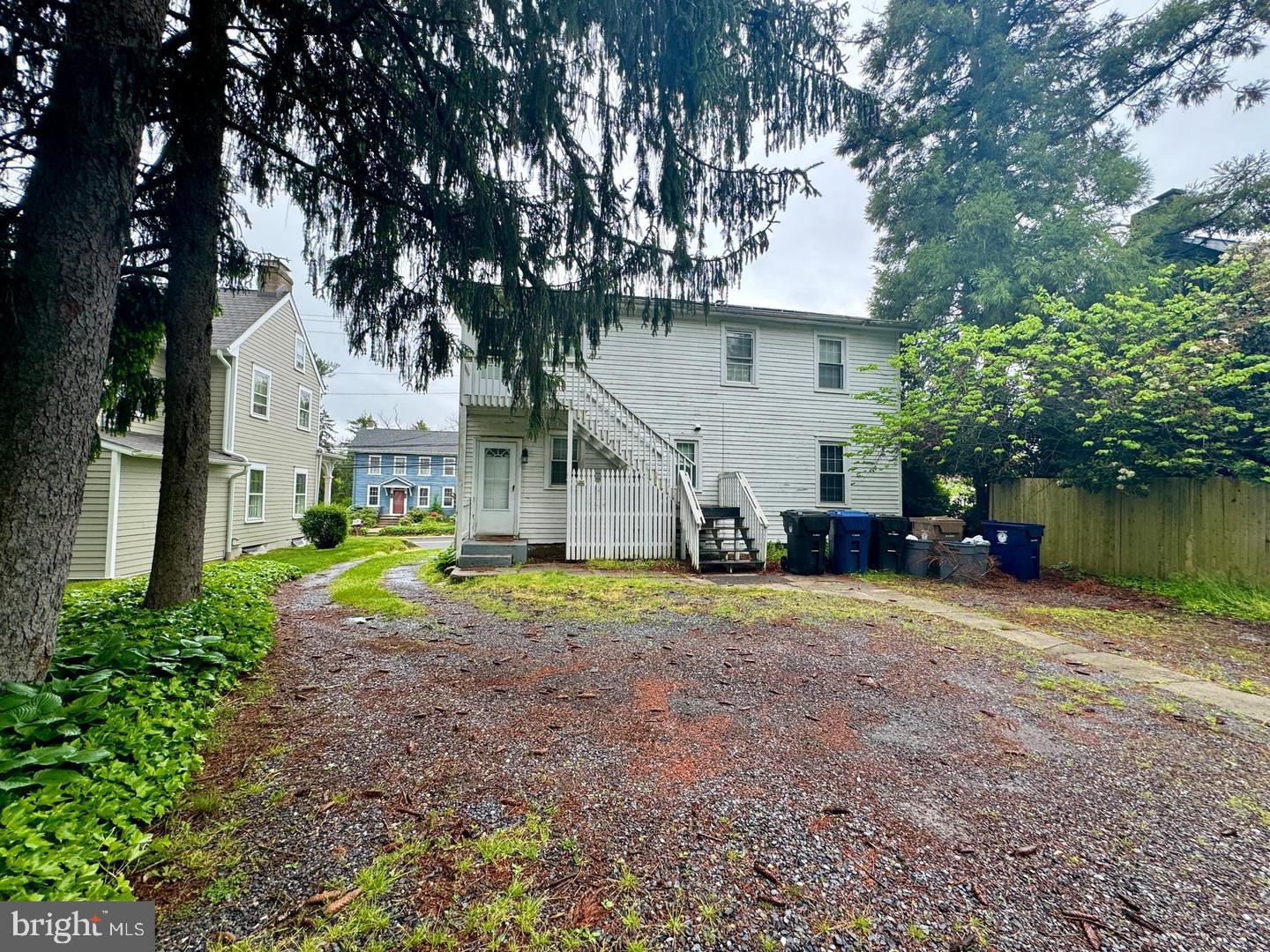74 South Main Street, Unit A Mullica Hill, NJ 08062 - Photo 2 of 4 a view of a house with a yard and tree