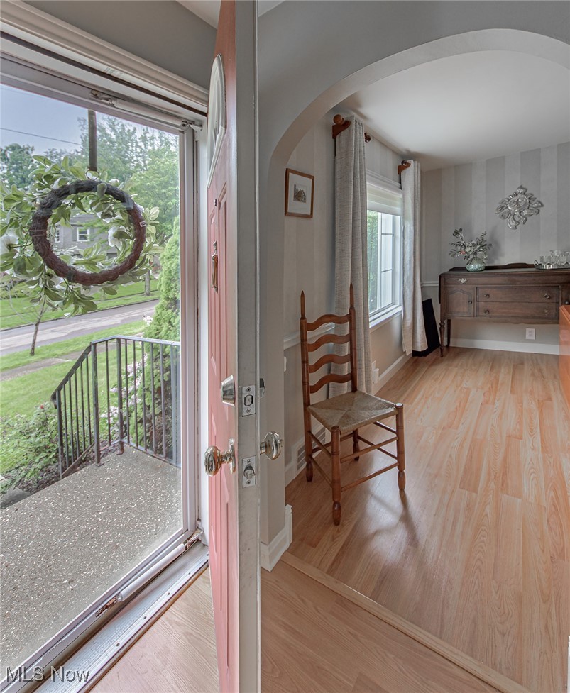695 Ecton Road Akron, OH 44303 - Photo 3 of 26 Entering the center hall colonial, one immediately notices the clean lines of the flooring and the neutral tones. To the left, the formal dining room.