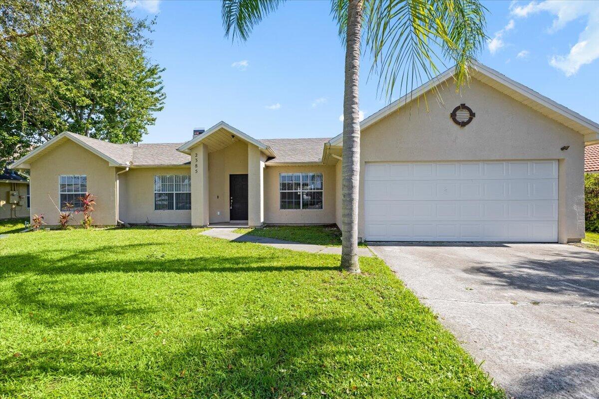 2385 Southwest Neal Road Port St. Lucie, FL 34953 - Photo 4 of 38 04-424A1290