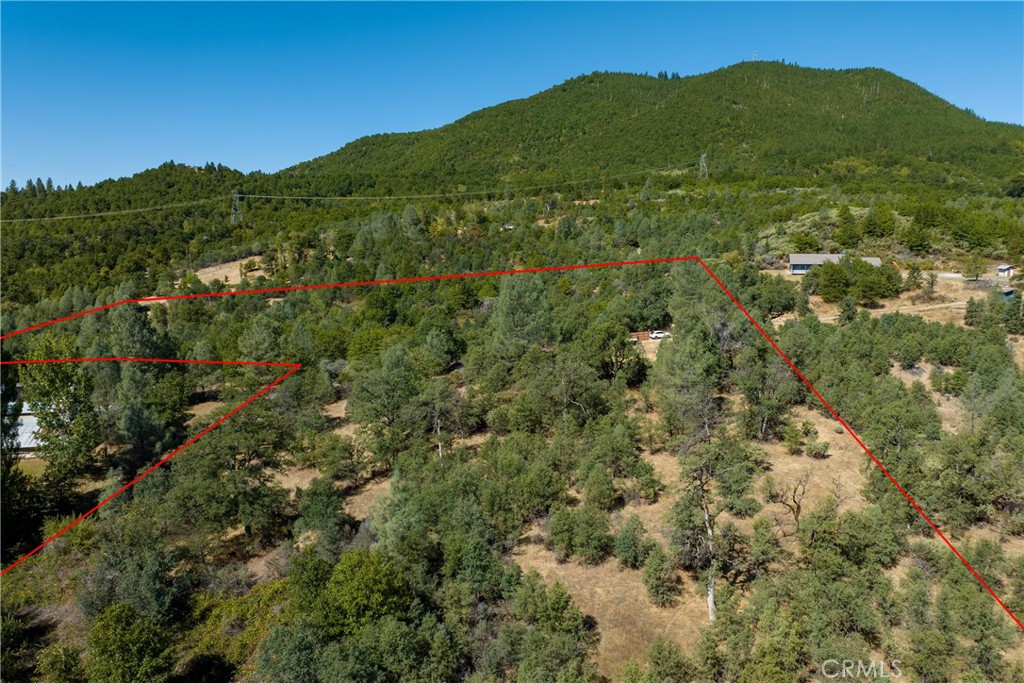 0 Round Mountain Road Round Mountain, CA 96084 - Photo 4 of 8 a view of a large mountain with mountains in the background