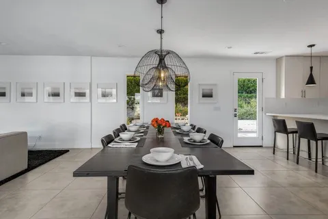 a bathroom with a sink double vanity and a mirror