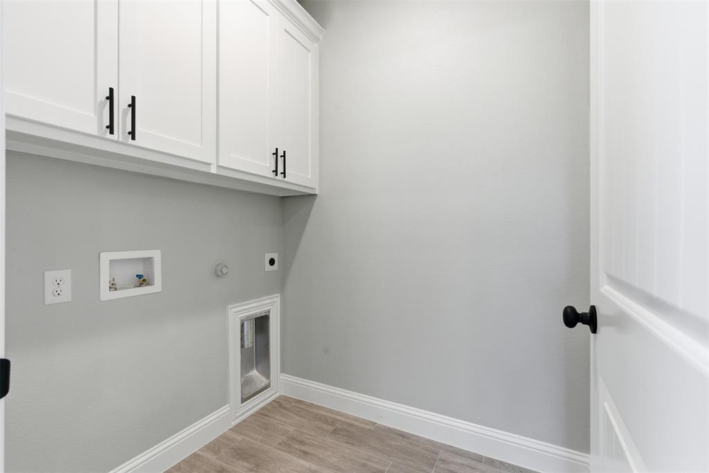 412 Ball Street Tom Bean, TX 75491 - Photo 10 of 28 a view of cabinets and wooden floor