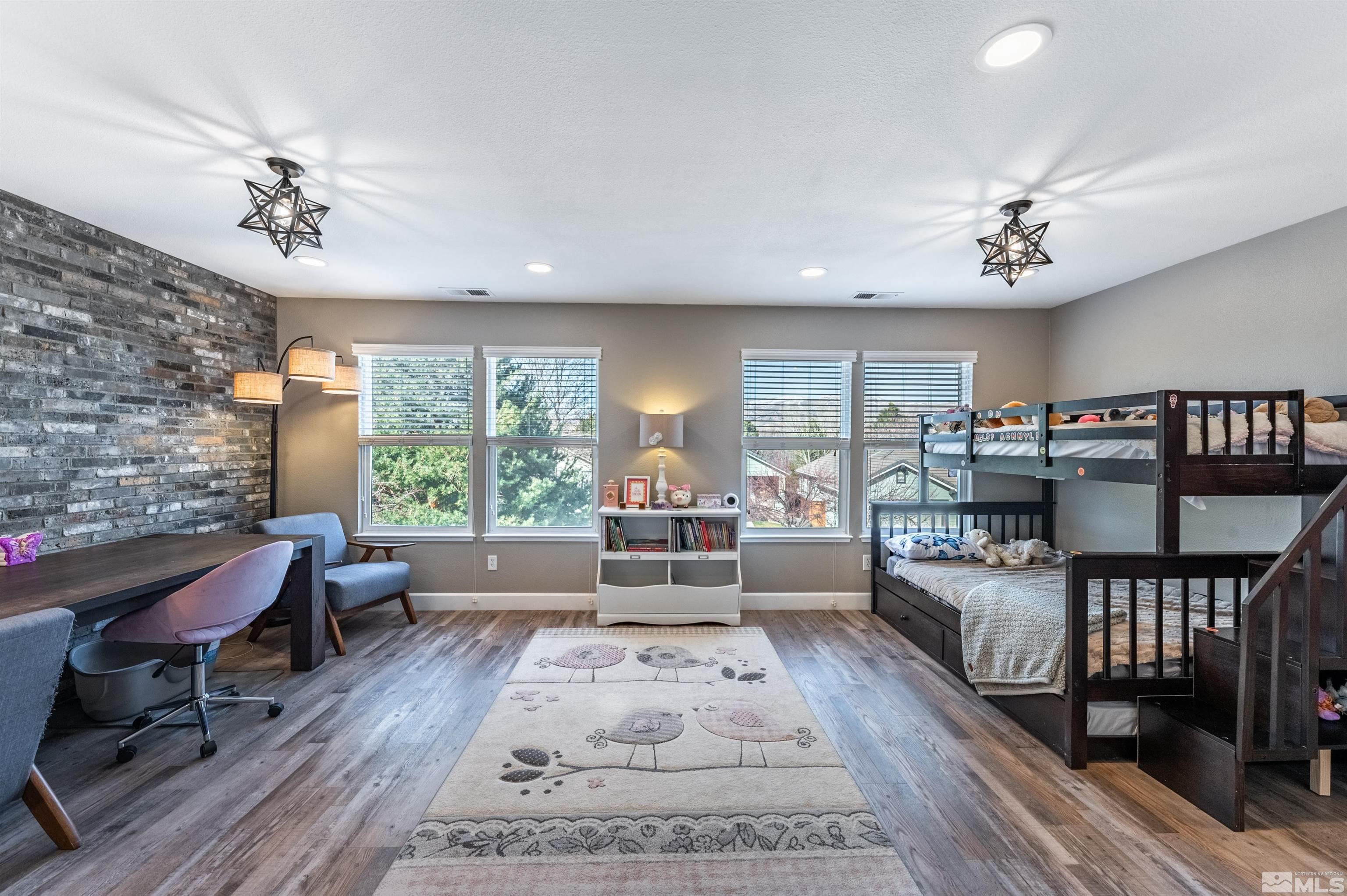 760 Caughlin Glen Reno, NV 89519 - Photo 24 of 40 a living room with furniture and wooden floor