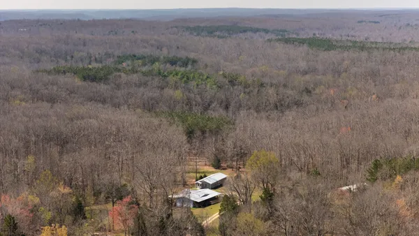 a view of a lake with a yard