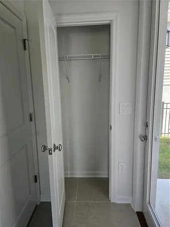 a bathroom with a glass door shower
