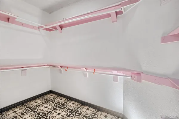 a view of an empty walk in closet