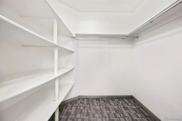 a view of a room with racks on the wall