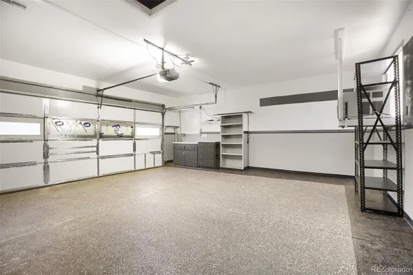 a view of a storage & utility room with racks