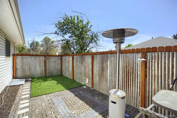 a view of a backyard with a potted plant