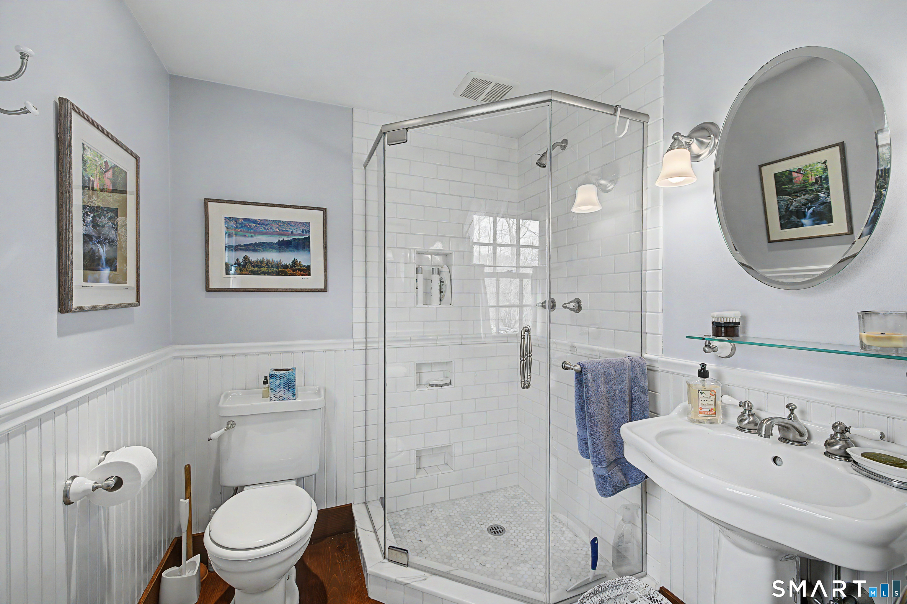 75 Lake Lillinonah Road North Bridgewater, CT 06752 - Photo 11 of 18 a bathroom with a shower a sink and mirror with toilet