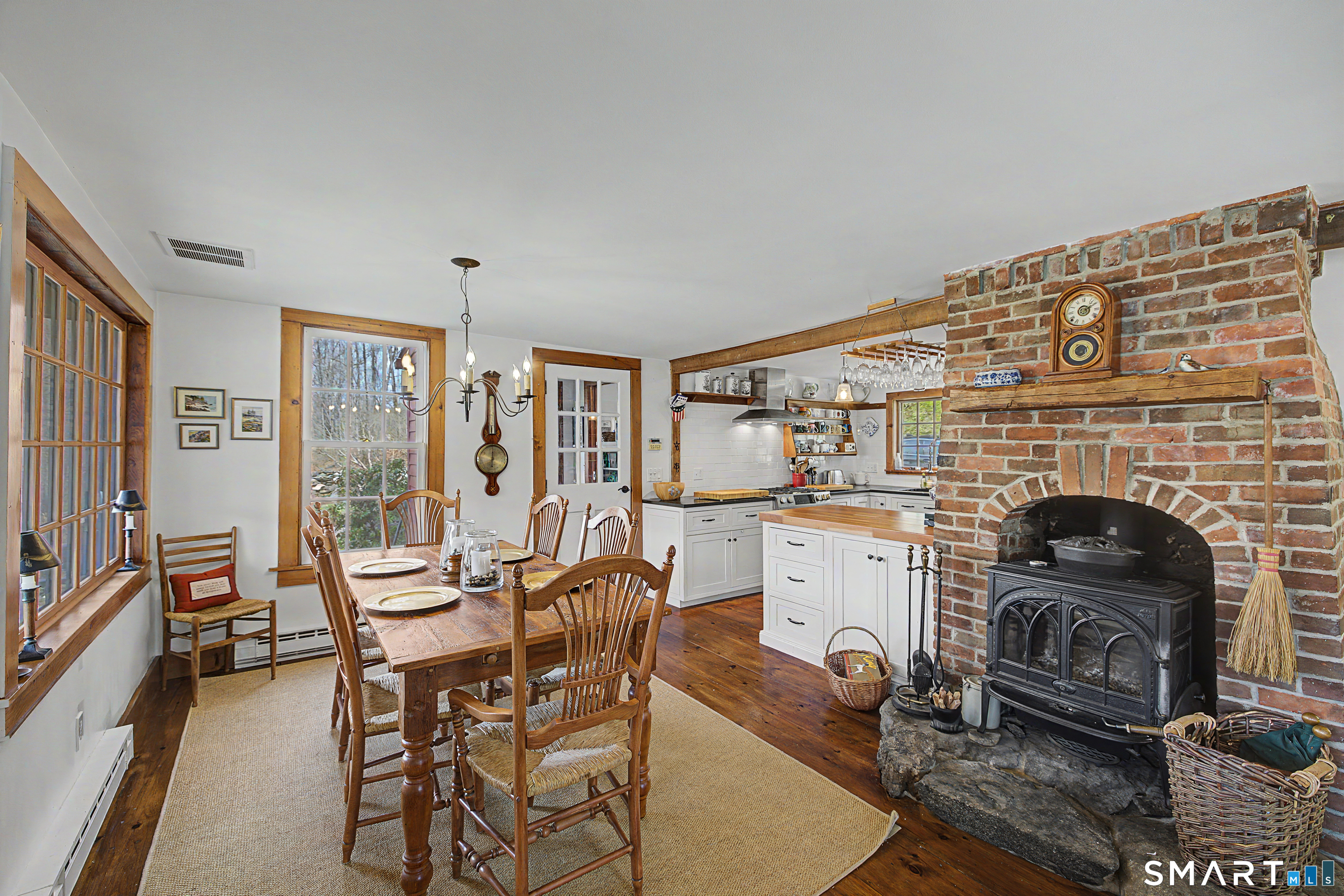 75 Lake Lillinonah Road North Bridgewater, CT 06752 - Photo 5 of 18 a living room with furniture a fireplace and city view