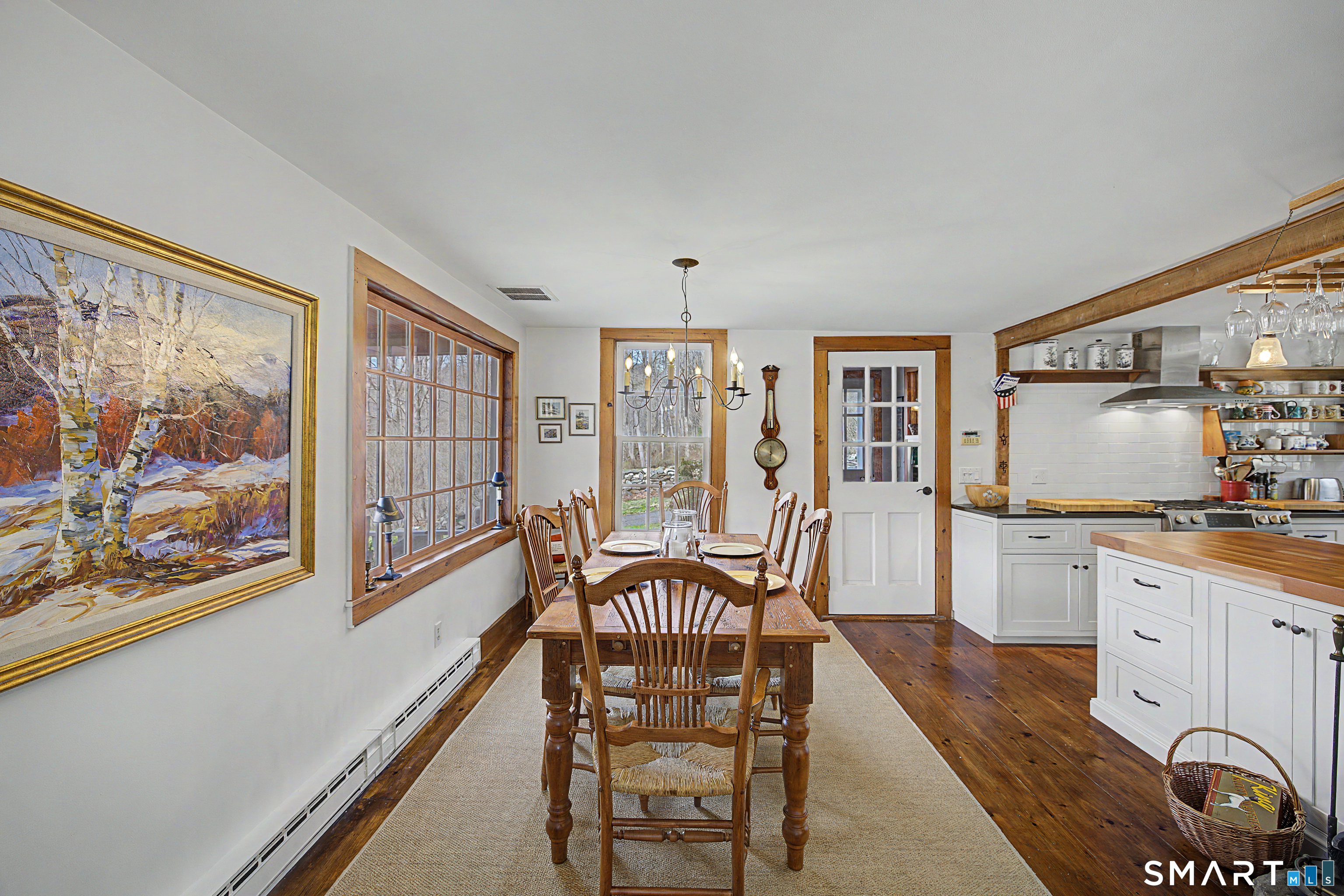 75 Lake Lillinonah Road North Bridgewater, CT 06752 - Photo 6 of 18 a view of a dining room with furniture window and wooden floor