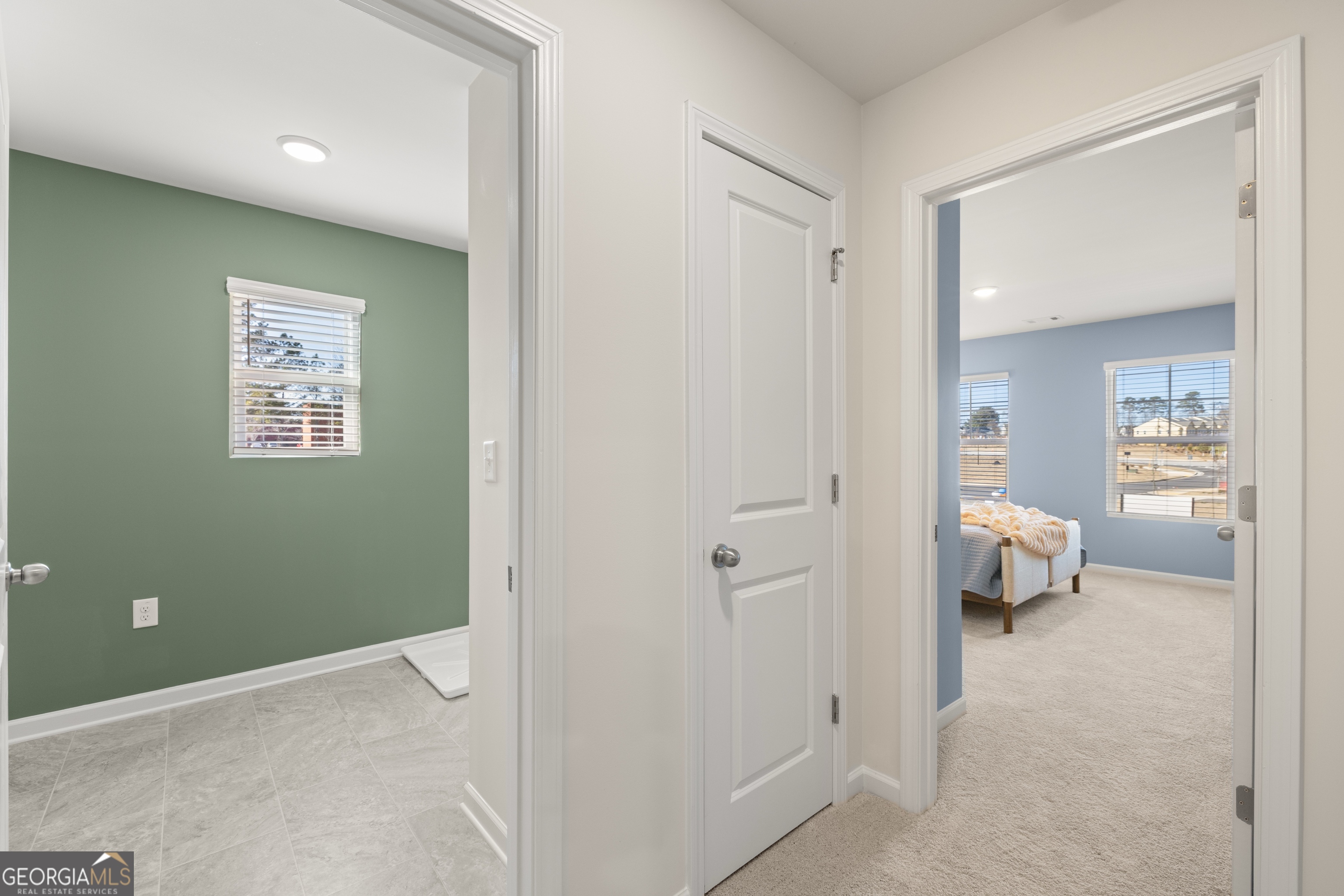 3263 Lake Carlton Road, Unit 23 Loganville, GA 30052 - Photo 20 of 33 a view of a bedroom with tub and shower