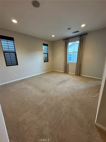 a bathroom with a sink a large mirror and a bathtub