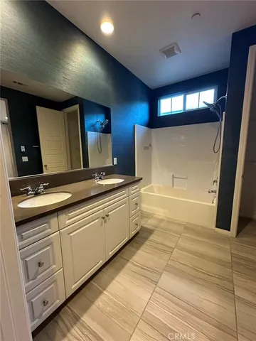 a bathroom with a toilet and a sink