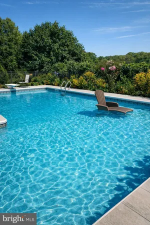 a view of a yard with an outdoor seating