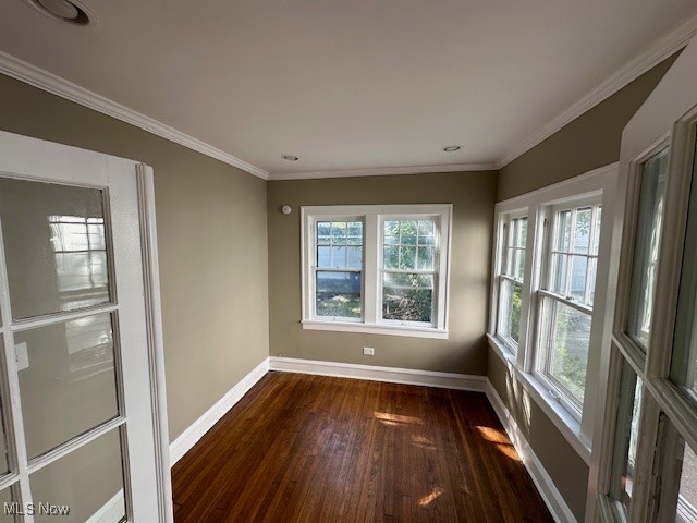 3282 Yorkshire Road Cleveland, OH 44118 - Photo 8 of 33 Spare room featuring ornamental molding and dark hardwood / wood-style flooring