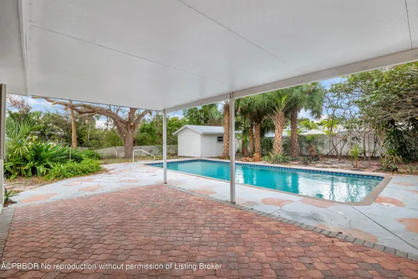 a view of a backyard with porch
