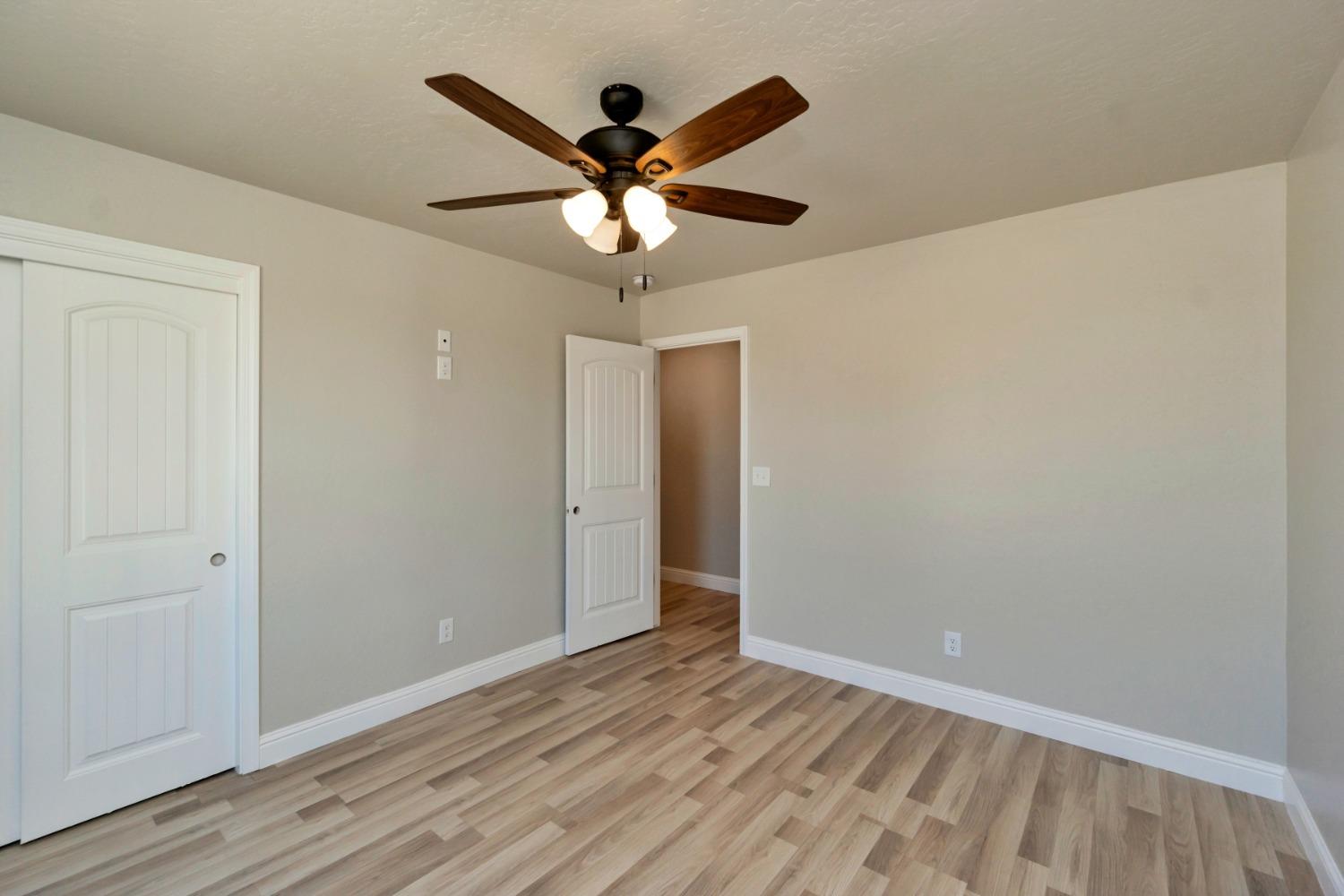 21250 Steward Road Madera, CA 93638 - Photo 14 of 40 wooden floor in an empty room