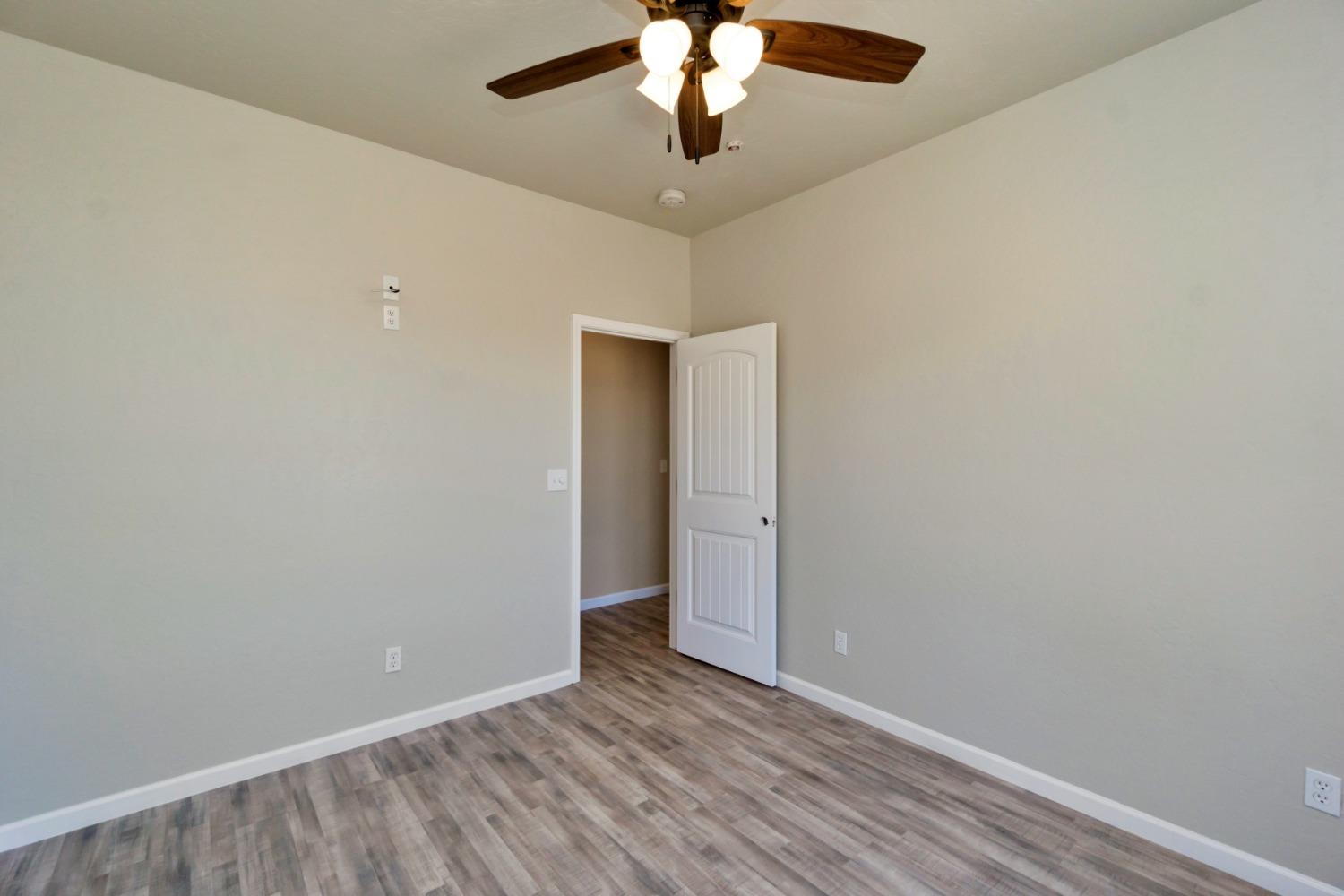 21250 Steward Road Madera, CA 93638 - Photo 32 of 40 a view of an empty room with window closet area