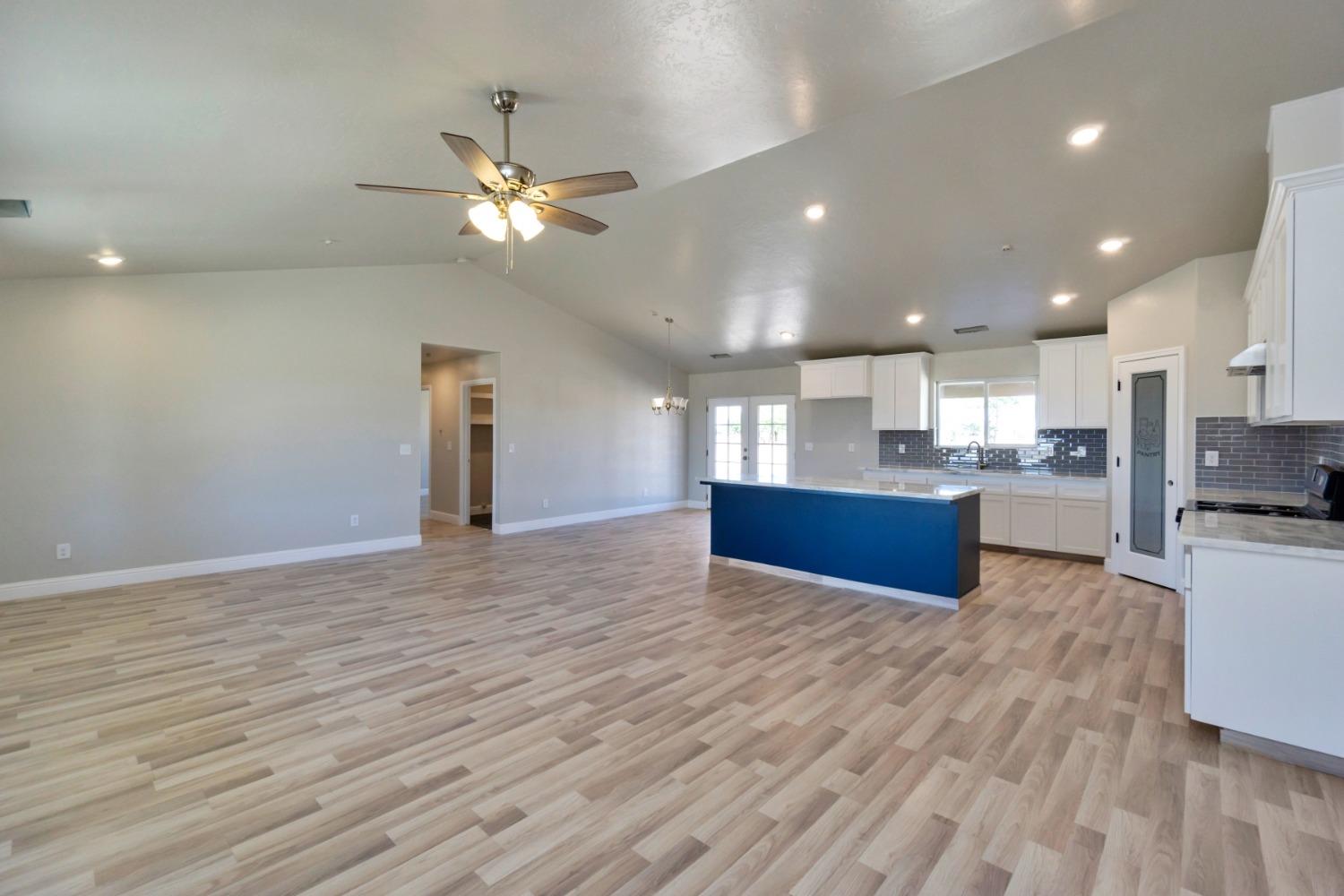 21250 Steward Road Madera, CA 93638 - Photo 7 of 40 a view of kitchen with wooden floor and a window