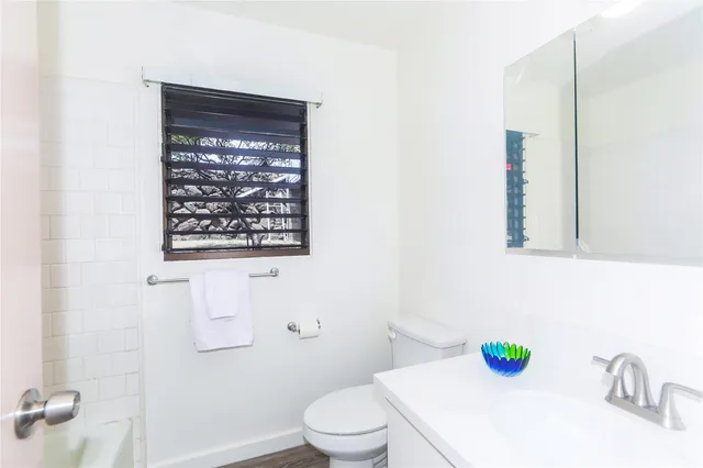 a bathroom with a sink and a toilet