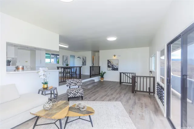 a living room with furniture and a table