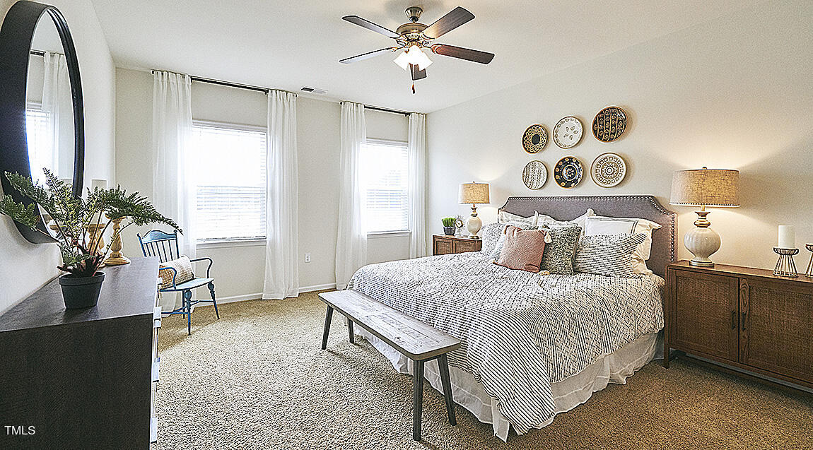 1733 Post Oak Drive Haw River, NC 27258 - Photo 12 of 26 a bedroom with a bed and a window