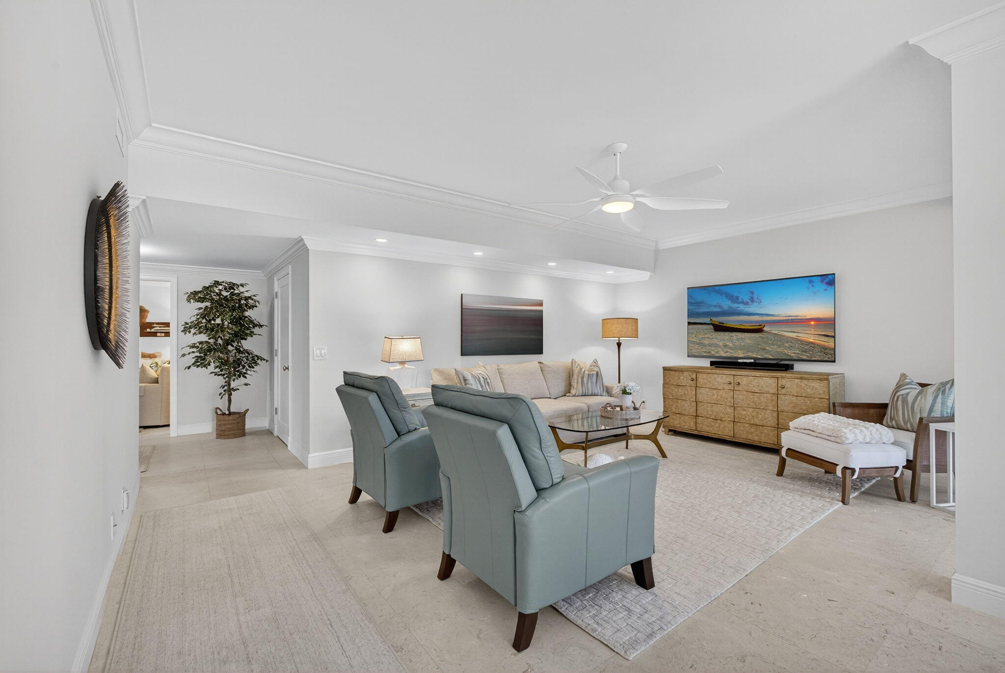 16050 West Bay Drive, Unit 155 Jupiter, FL 33477 - Photo 11 of 51 a living room with furniture and a flat screen tv