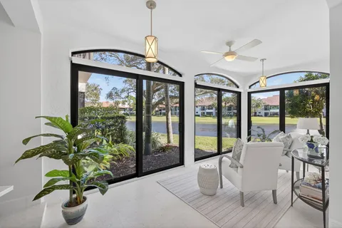 a very nice looking room with furniture window and outside view