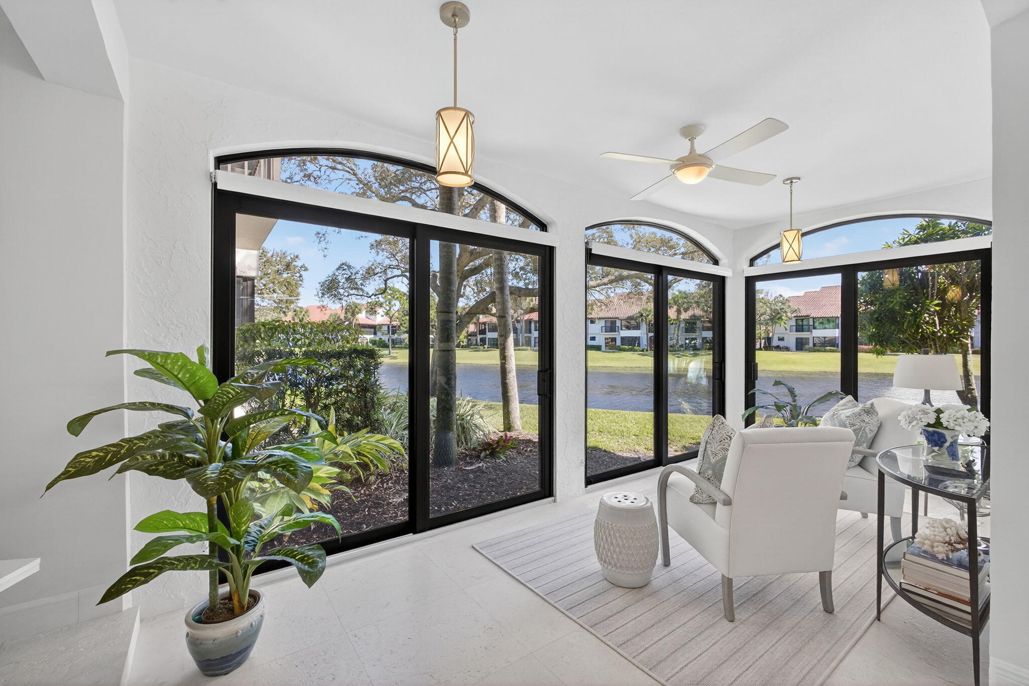 16050 West Bay Drive, Unit 155 Jupiter, FL 33477 - Photo 15 of 51 a very nice looking room with furniture window and outside view