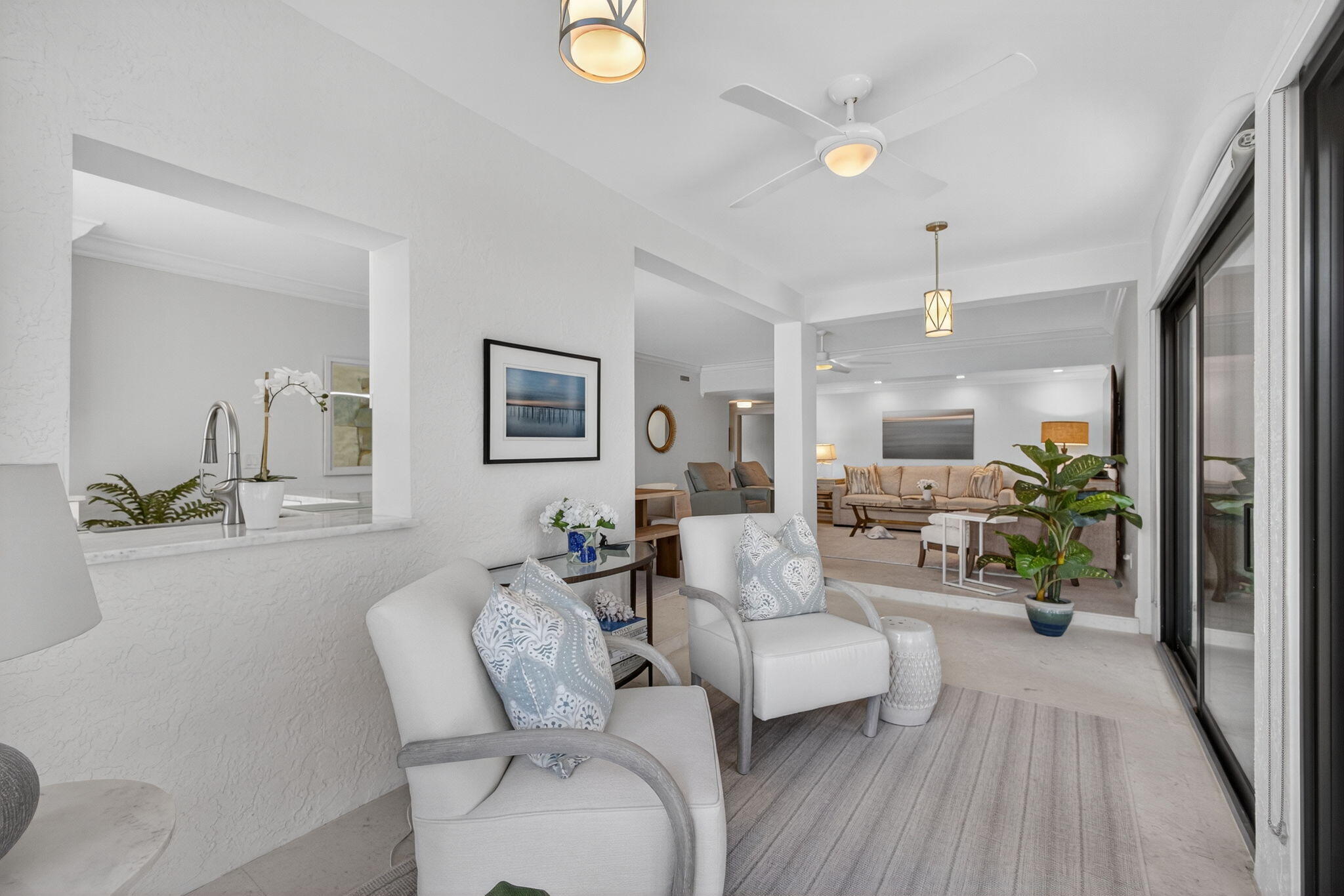 16050 West Bay Drive, Unit 155 Jupiter, FL 33477 - Photo 17 of 51 a living room with furniture and a table