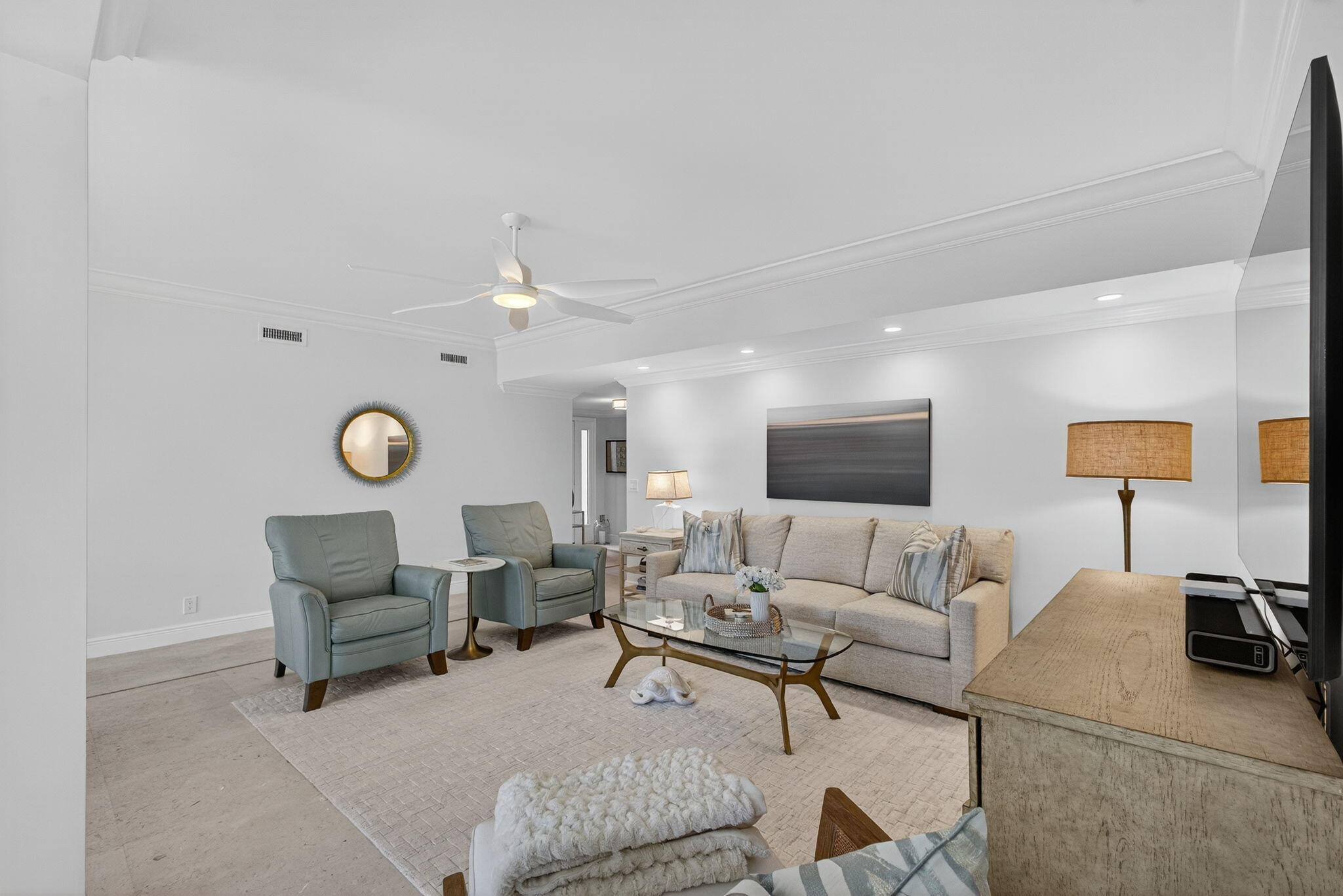 16050 West Bay Drive, Unit 155 Jupiter, FL 33477 - Photo 19 of 51 a living room with furniture a rug and a lamp
