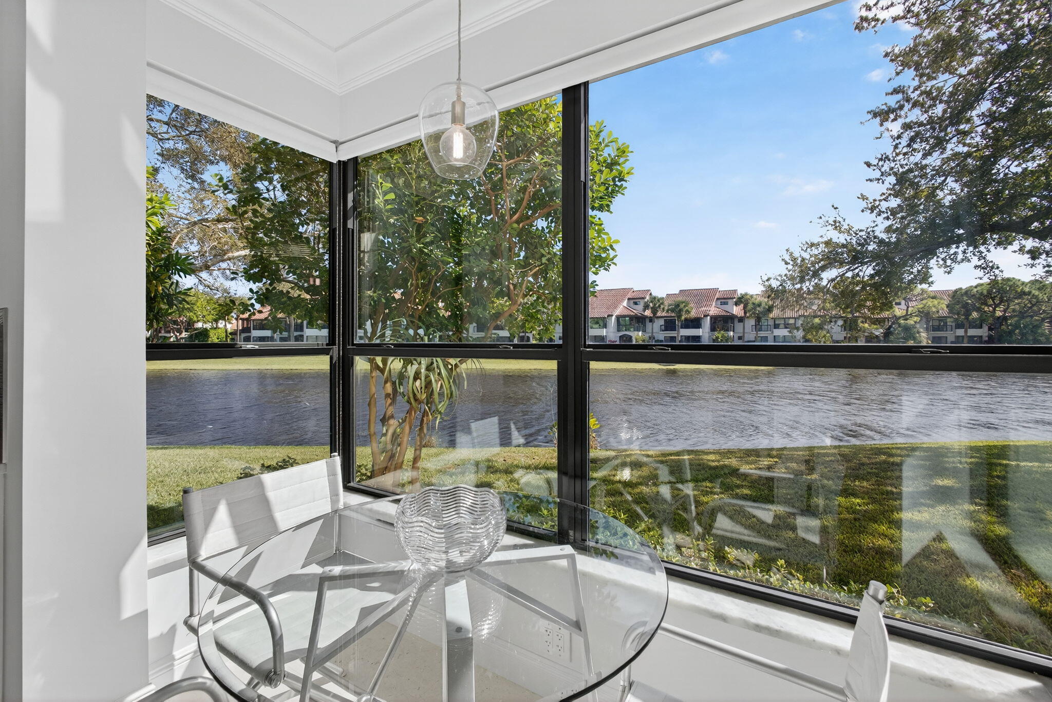16050 West Bay Drive, Unit 155 Jupiter, FL 33477 - Photo 26 of 51 a view of a lake from a balcony
