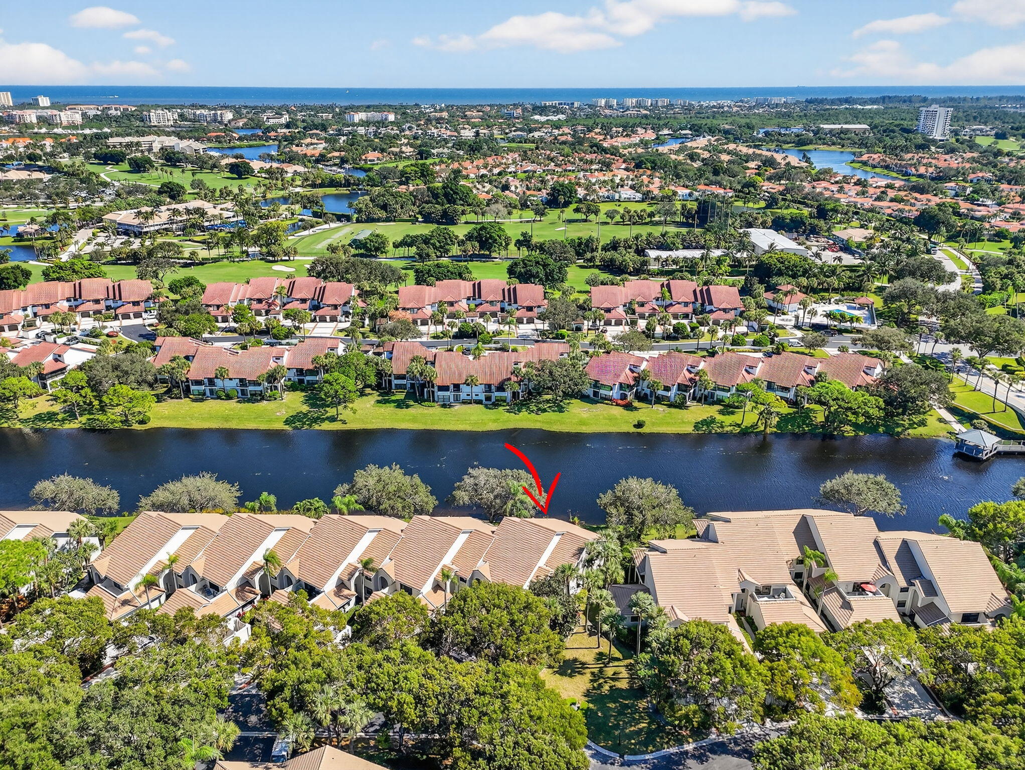 16050 West Bay Drive, Unit 155 Jupiter, FL 33477 - Photo 48 of 51 an aerial view of a house with a lake view