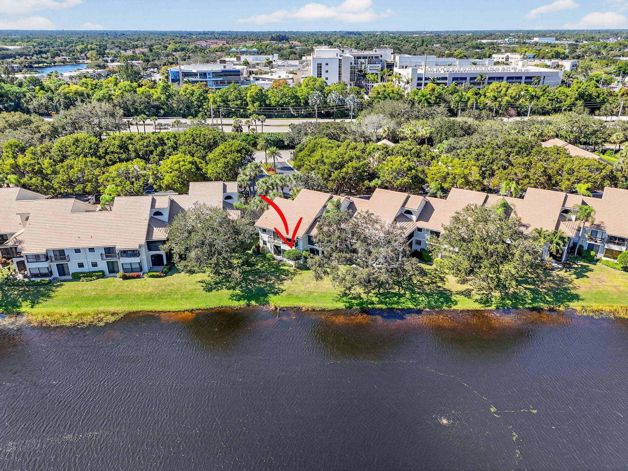 16050 West Bay Drive, Unit 155 Jupiter, FL 33477 - Photo 50 of 51 an aerial view of a house with a lake view