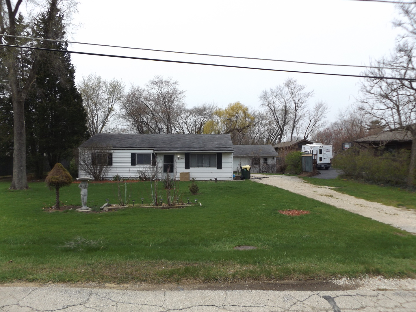 3610 North Old Buffalo Grove Road Arlington Heights, IL 60004 - Photo 1 of 3 a view of a house with a yard