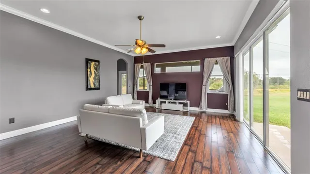 a view of room with a ceiling fan