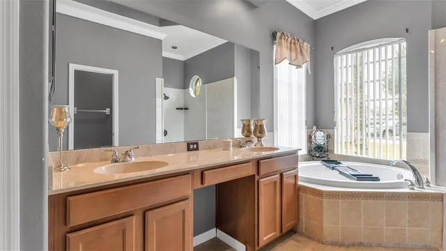 a bathroom with a shower and a sink