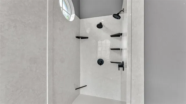 a bathroom with a sink and a bathtub