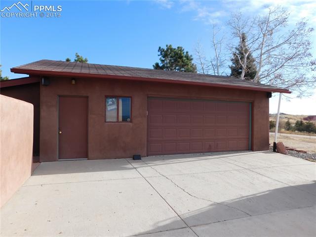 4320 Meridian Road Peyton, CO 80831 - Photo 21 of 28 Detached compressor garage