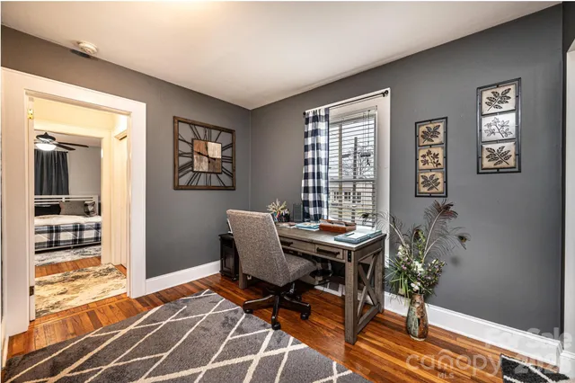 a view of a bedroom from a hallway